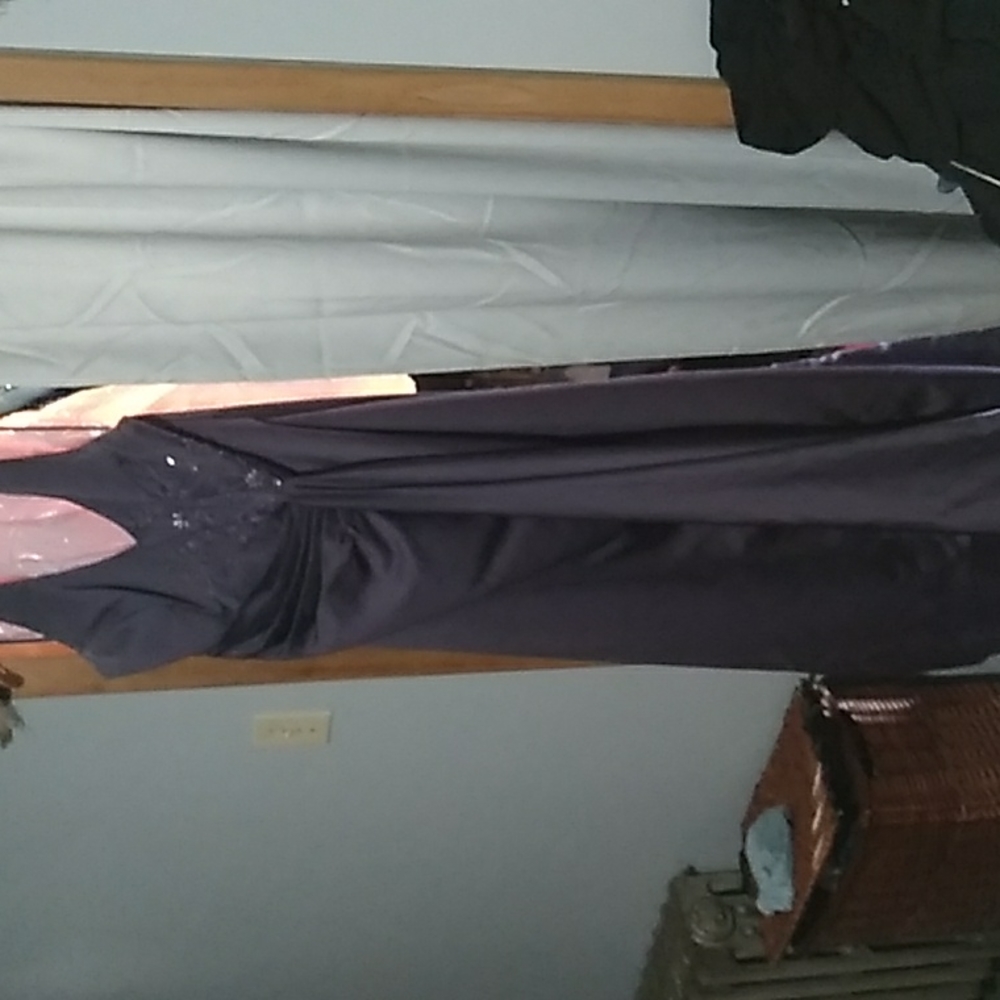 A dark purple prom dress